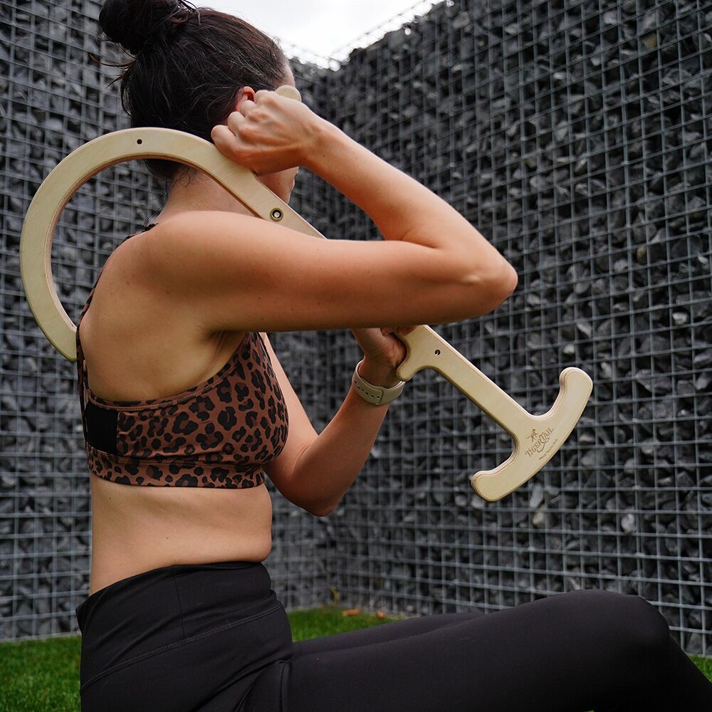 The ReGreen Tiger Massage Hook is a sustainable and travel-friendly massage tool that can help relieve minor muscle aches, muscle knots, and sore muscles. Its innovative design helps you easily massage hard-to-reach muscle knots in your back and shoulders.
